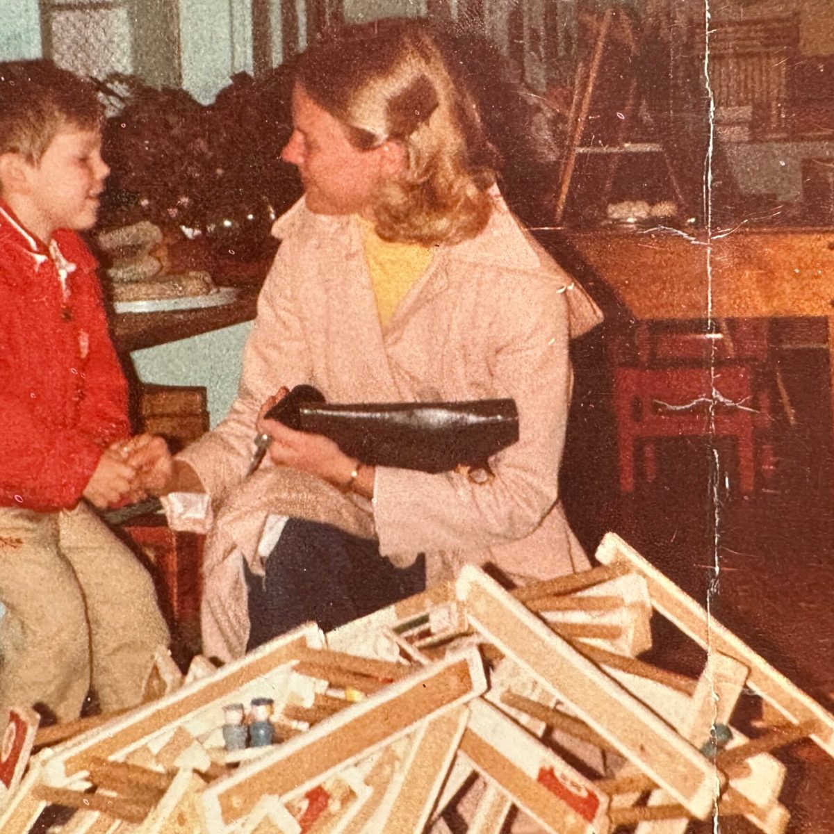 a man and a woman sitting on a table
